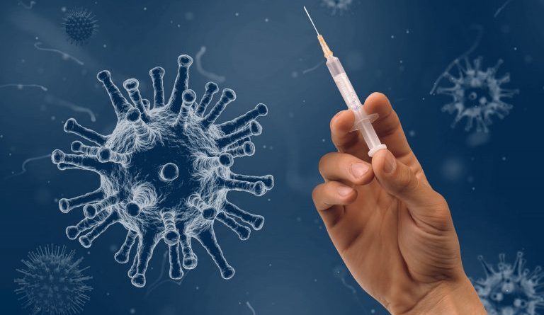 Image de virus et seringue symbolisant maladie du covid-19.